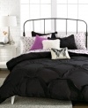 Dramatic yet completely chic. This Luna duvet cover set makes an impact with a sophisticated black hue and scalloped design for stylish texture and a hint of intrigue. Finish your bed with colorful sheets and an assortment of decorative pillows for the perfect balance.
