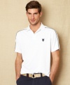 This polo golf shirt from Nautica is a solid accessory to your stellar game.