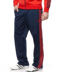 Hit your stride in style. You'll be ready to take every pass to the basket in these comfortable tricot track pants from adidas.