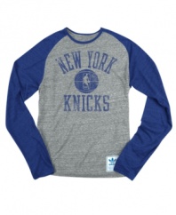 Rush the court! Be a part of the team victory with this New York Knicks NBA raglan shirt from adidas.
