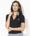 A preppy gingham collar and Ralph Lauren's signature LRL-monogrammed crest give this super-soft stretch cotton Lauren by Ralph Lauren polo a chic finish for a stylish yet sporty look.