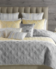 Two to tango. Allover embroidery renders supreme texture in this Tango comforter set from Bryan Keith, featuring a delicate color palette of muted gray, yellow and white for a soothing appeal. Shams and decorative pillows offer complementary embroidered designs for a complete look that pays close attention to detail. Pair with matching window panels.