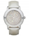 A cluster of clear crystals lend an elegant touch to this casual watch from DKNY.