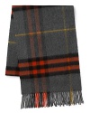 Crafted in luxurious cashmere in rich autumnal tones, this essential scarf brings depth to your fall wardrobe.