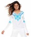 The beauty's in the beading! INC's dramatically embroidered and bejeweled petite tunic adds exotic flair to any outfit.