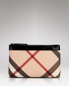 A sleek cosmetic pouch in Burberry's iconic check print.