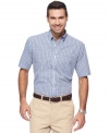 With a breezy, short-sleeved style and a crisp check pattern, this Van Heusen shirt will be your warm-weather go-to.
