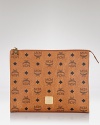 This retro logo-print case has ample space to carrying must-have cosmetics in organized style. By MCM.