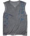 When the mercury rises, this Guess sleeveless tee keeps your cool intact.