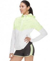 Sporty style gets ultra-chic in Nike's zip-up jacket, featuring mixed fabrics in sleek springtime colors. Perfect for those early morning jogs!