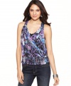 A beautiful print and fabric flourishes keep this Cha Cha Vente top looking fresh!