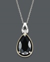 Onyx is definitely the new black! Stylish and statement-making, this pear-cut onyx stone (2-3/8 ct. t.w.) stands out against a sterling silver and 14k gold setting. A touch of extra shine is created by a round-cut diamond accent. Approximate length: 18 inches. Approximate drop: 3/4 inch.