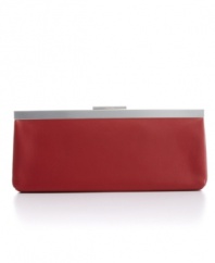 Calvin Klein gives a modern interpretation to the classic clutch. Available in bright crimson, glossy silver or cracked black or coordinate with any elegant evening look.