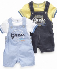 Ready to romp around. Get him ready to play all day with this comfy t-shirt and shortall set from Guess.