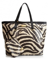 Go wild for this sassy zebra print tote from R&Em. Featured in a variety of fun colors, this roomy design is ideal for a long day of shopping with the girls, or a relaxing day at the beach.