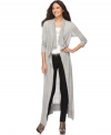 Go to great lengths in Fever's cozy knit cardigan! The longer, duster-length shape adds a dramatic touch to any outfit.