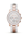 Fresh white is warmed up with shining rose gold in this ultra chic timepiece with three-eye functionality from MICHAEL Michael Kors.