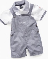 Ship out! Get him ready for the day in no time with this darling matching shirt and shortall outfit from Nautica.