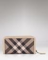 A chic zip-around wallet in Burberry's signature check print.