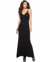 A cutout detail adds eye-catching appeal to this BCBGMAXAZRIA maxi dress -- a fashionable foundation for statement extras!
