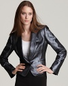 A steely, ultra-modern finish and precise tailoring create this unforgettable Anne Klein New York metallic blazer.