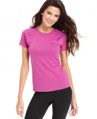 Perfect for working out or just hanging out, this sleek tee by The North Face is a wardrobe essential. The moisture-wicking fabric keeps you cool and comfy, too!