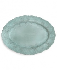 Handcrafted in the Italian tradition, the Merletto oval platter is intricately embellished with a lacy floral texture and painted a serene aqua hue. An elegant companion to Arte Italica dinnerware.