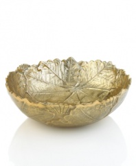 Serve fresh greens in natural splendor with the Gold Leaf salad bowl, featuring inspired detail and a brilliant gold-lacquer finish by Martha Stewart Collection.