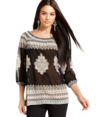 The relaxed shape of INC's tunic makes an elegant contrast to the exotic print and studded sparkle!
