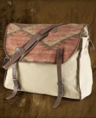Rustic serape patchwork and rich leather accents give vintage edge to a durable cotton canvas messenger bag.