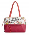 A fresh floral print with rocker-chic accents, this traffic-stopping tote by Ed Hardy is sure to turn heads. Sparkling rhinestones decorate signature front logo on floral detailed canvas.