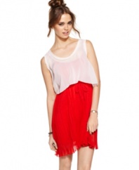 Look pretty in pleats with this frock from Urban Hearts, where a gauzy, crop top overlays a gorgeously textured dress!