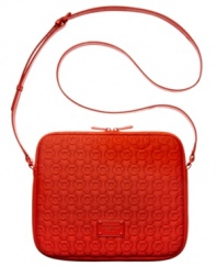Give your iPad some extra attention with this bright, bold-colored crossbody from MICHAEL Michael Kors.  Dressed up in signature-embossed circles, the ultra-soft neoprene design is perfectly padded so your treasured tech toy stays safe when you're on the move.