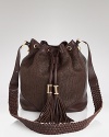 Rachel Zoe channels a vintage vibe with this slouchy, drawstring shoulder bag. In raffia and leather, it's a hippie-chic way to work this season's textured trend.