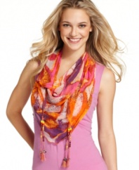 Kick off the season with high-flying style from Steve Madden. This colorful printed scarf flaunts fab fashion with colorful bead detail.