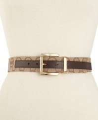 Live for logo envy: Throw on multifaceted vintage appeal with this chic MICHAEL Michael Kors reversible belt.