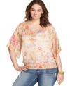 Cool details like a sheer fabric and henley styling set American Rag's plus size top apart from the rest!