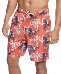 Dressed for exploration. Bring the underwater adventures to land with these fun, seahorse print swim trunks from Club Room.