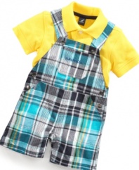 Perfectly paired. Bold colors show off his bright, sunny side in this polo shirt and plaid shortall set from Nautica.