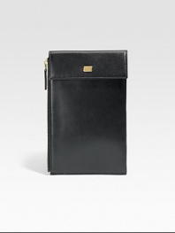 A stylish travel companion with all of the necessary compartments to store your boarding pass, passport, credit cards, money and other important documents, crafted in soft Italian calfskin leather.Zip, snap button closureWrist strapOne bill compartmentSix card slots6W x 8HLeatherMade in Italy