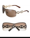 Rimless three-piece mount with marina chain temple. Available in gold frames with brown lens and chocolate frames with gray lens. Metal Made in Italy 