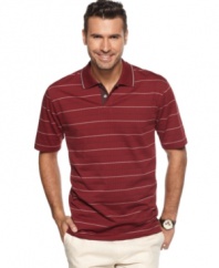 Turn classic style up a notch. Basic gets bolstered with this striped polo shirt from Van Heusen.
