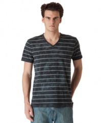 Starching your tees? Not cool. Get a worn-in look with this v-neck washed t-shirt from Calvin Klein.