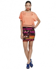 Inspired by the bold style of Brasil, this brightly printed Bar III body-con mini is perfect for a hot summer statement!