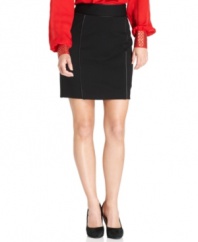 Sleek piping along the seams outlines this sleek Vince Camuto skirt, creating subtle, graphic definition on an elegant pencil silhouette. A statement blouse and understated heels make it just right for the office, but adding different accessories gives it a date-night feel.