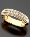 This two-tone band is the perfect stylish accent for the well-groomed gentleman. A channel of round-cut diamonds (1/5 ct. t.w.) set in 14k white gold is offset by the luster of 14k yellow gold.