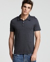 Casual and sporty, this classic polo shirt is knit in an undeniably soft cotton jersey.