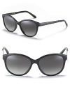 Small cat eye sunglasses with polka dot embellished arms, a stylish statement for any season.