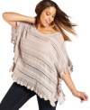 Metallic sheen adds a unique touch to INC's plus size swingy sweater. The open knit and scalloped hem give this look an extra dose of feminine charm.