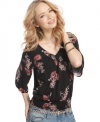 Be pretty as a flower in this top from American Rag that flaunts full bell sleeves and a sweet floral print!